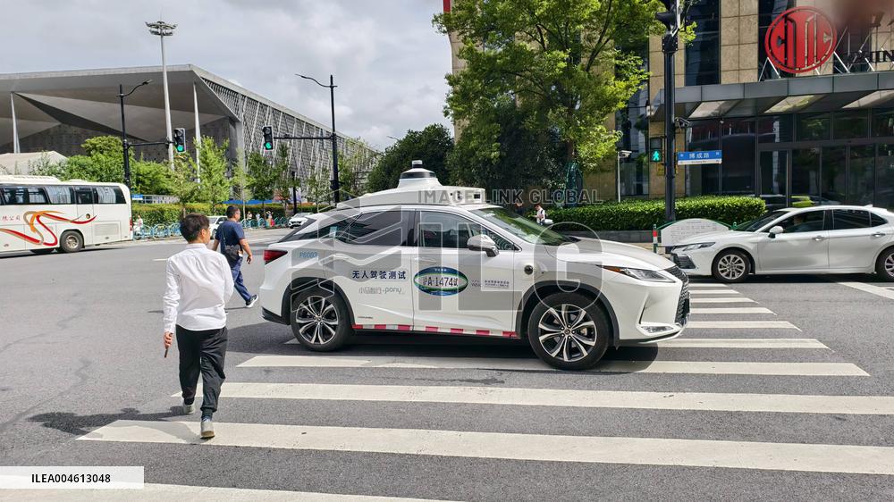 L4-level AI Autonomous Driving Car Experience Event at the 2025 WAIC in Shanghai