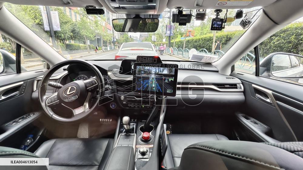 L4-level AI Autonomous Driving Car Experience Event at the 2025 WAIC in Shanghai
