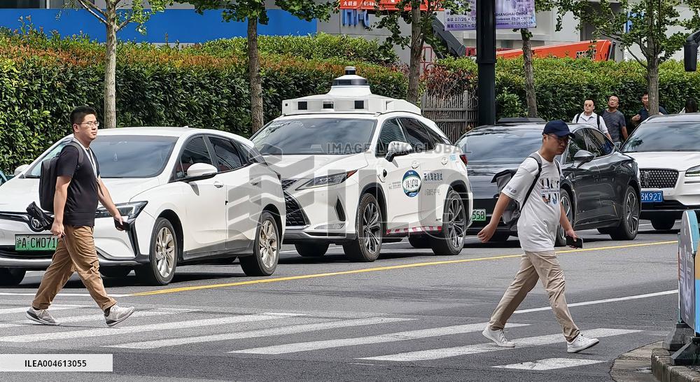 L4-level AI Autonomous Driving Car Experience Event at the 2025 WAIC in Shanghai
