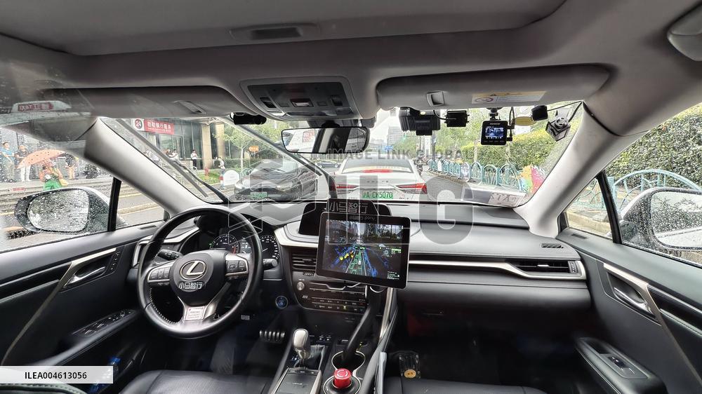 L4-level AI Autonomous Driving Car Experience Event at the 2025 WAIC in Shanghai