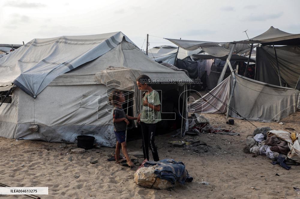 Displaced Family Prepares Meal Amid Food Shortages - Gaza City