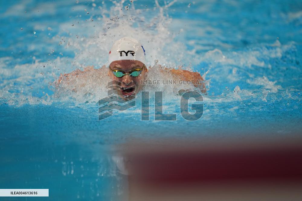 Leon Marchand Breaks 200 Medley Record at Swimming World Championships - Singapore