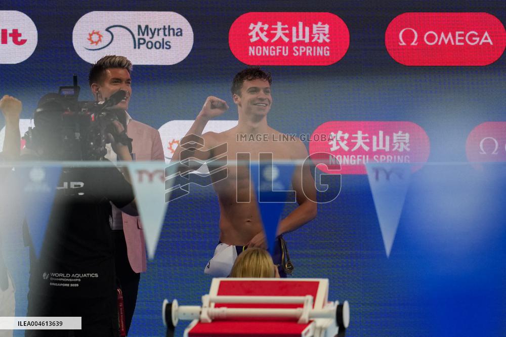 Leon Marchand Breaks 200 Medley Record at Swimming World Championships - Singapore