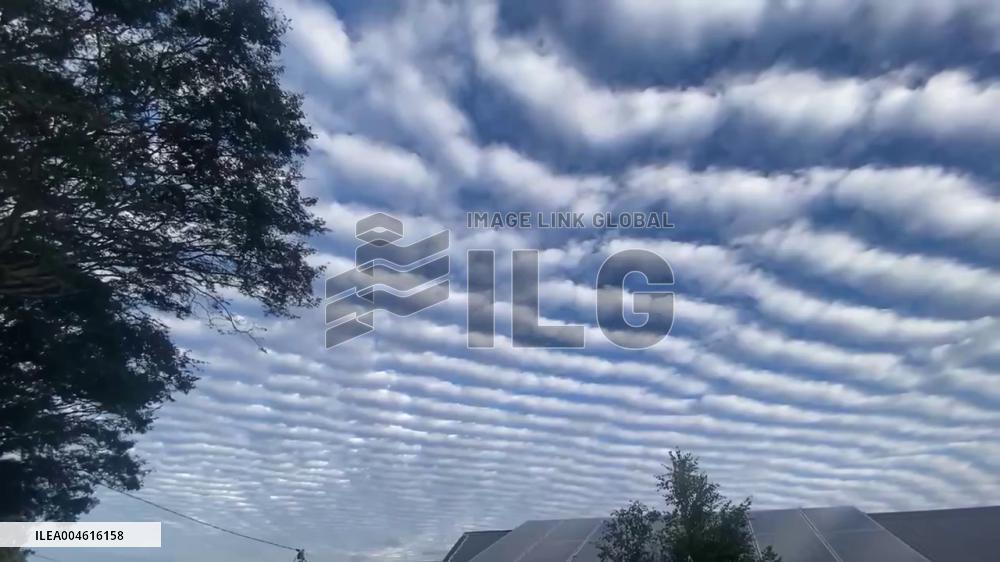 Australia: Altocumulus Clouds Appear Over Brisbane, Signaling Weather Shift
