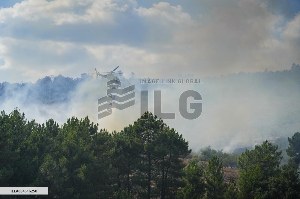 Troops Work to Control Fire Near Avellanar Caceres - Spain