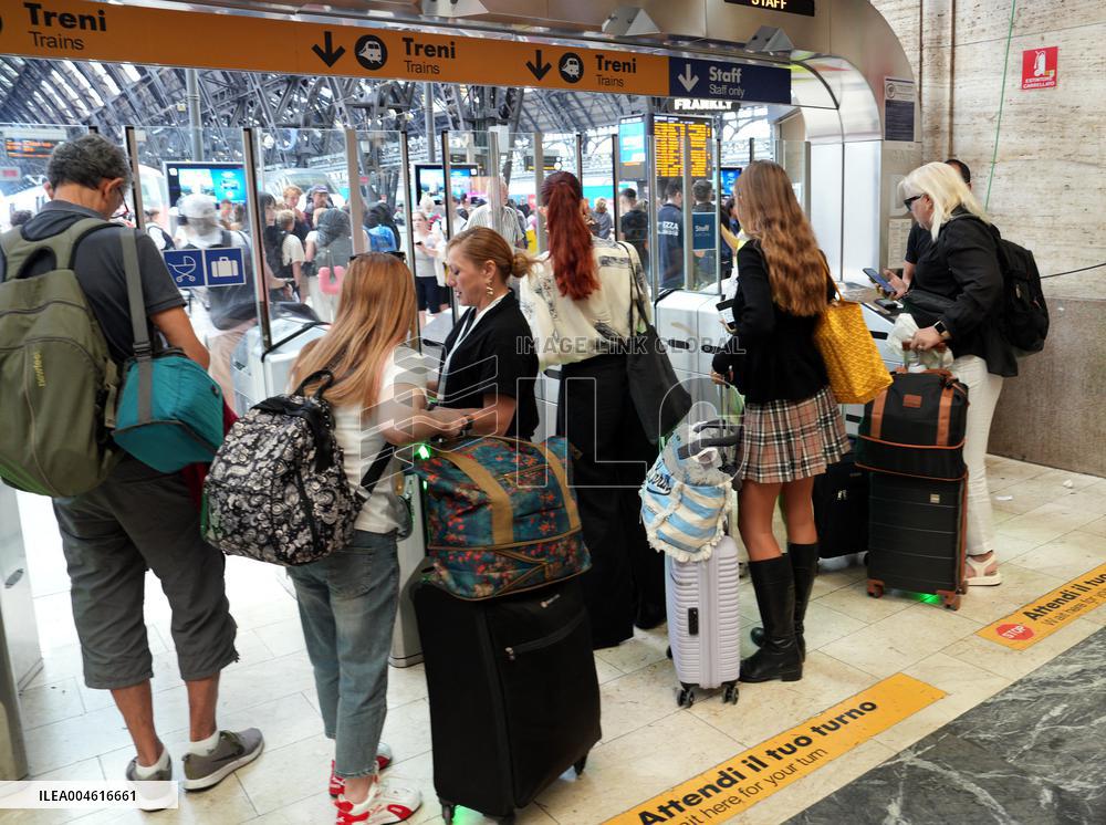 Exodus at Central Station Departures for the Summer Holidays - Milan