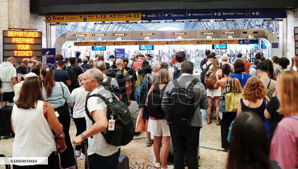 Exodus at Central Station Departures for the Summer Holidays - Milan