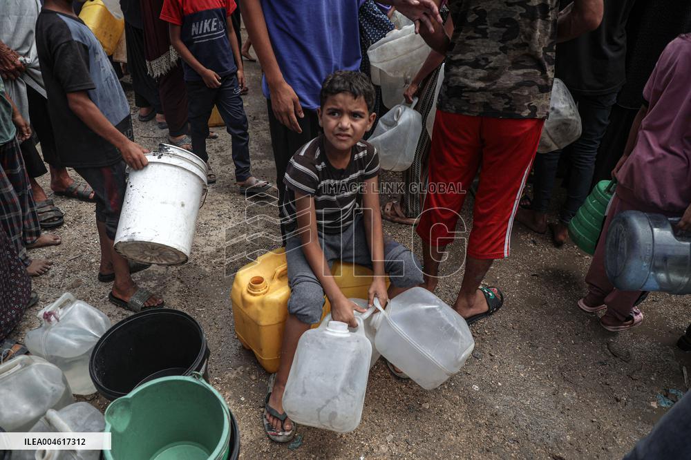 Fetching Water - Gaza City