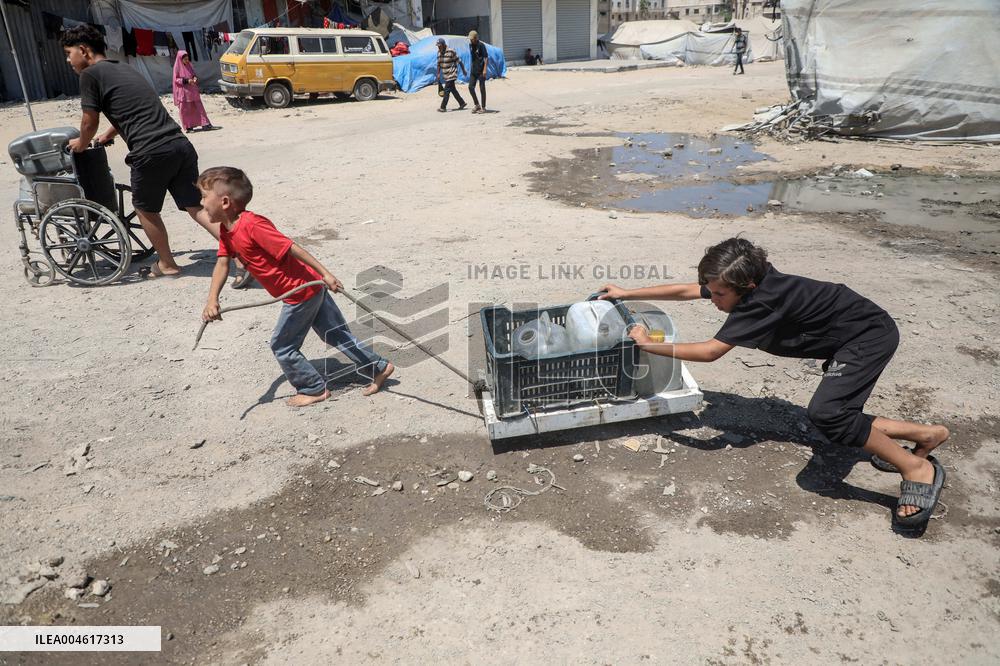 Fetching Water - Gaza City