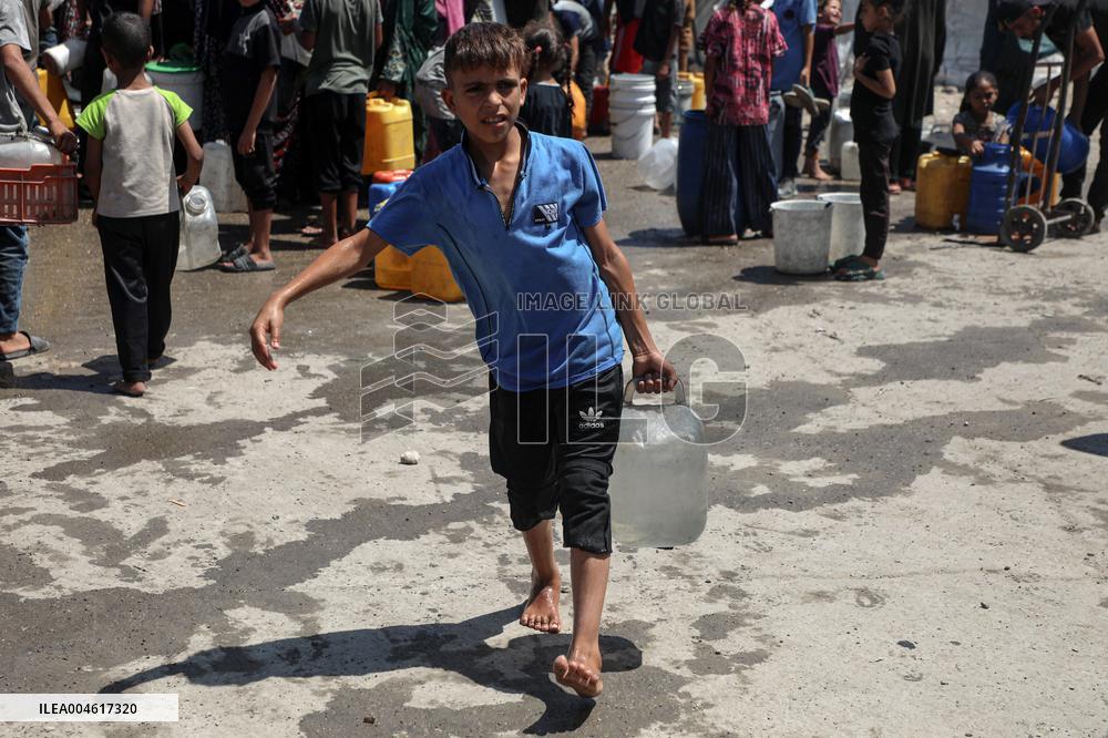 Fetching Water - Gaza City