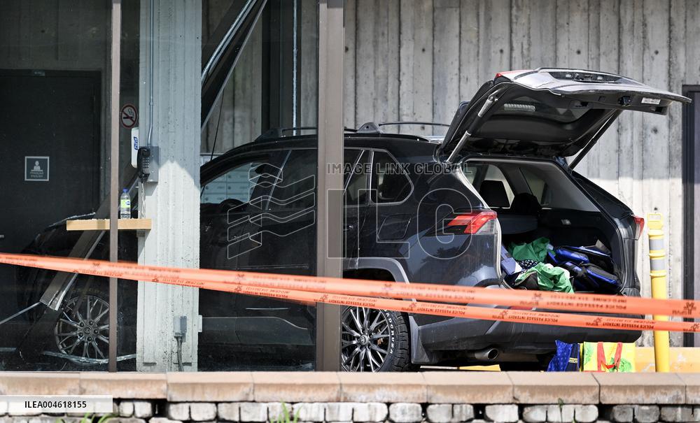 Car Crashes Onto RCMP Headquarters Entrance - Montreal