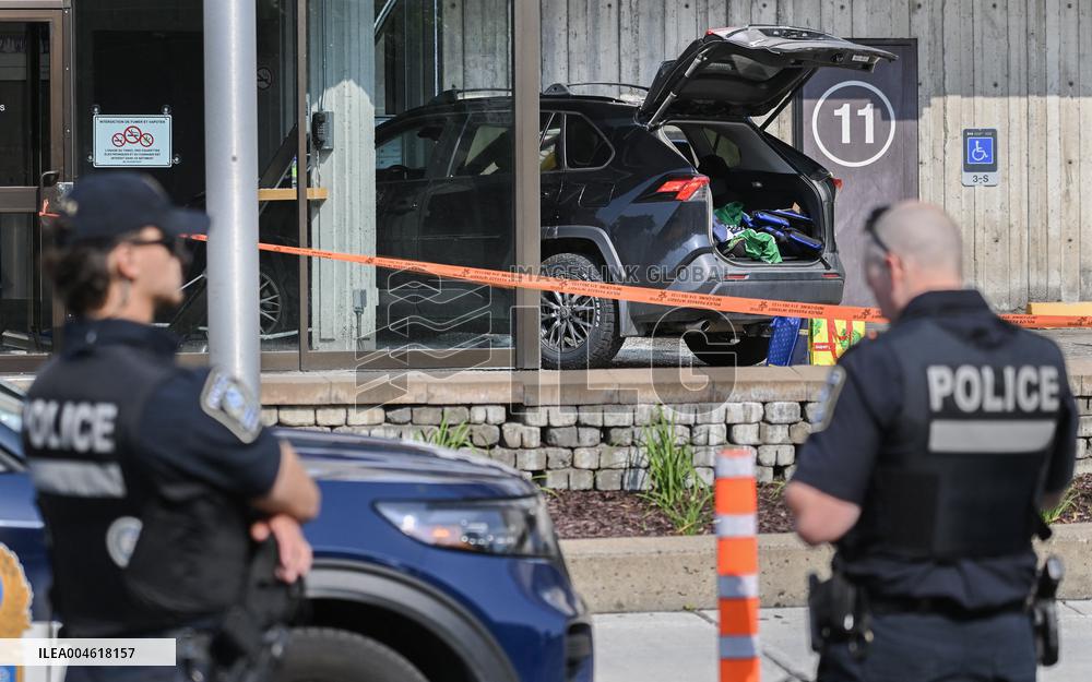 Car Crashes Onto RCMP Headquarters Entrance - Montreal