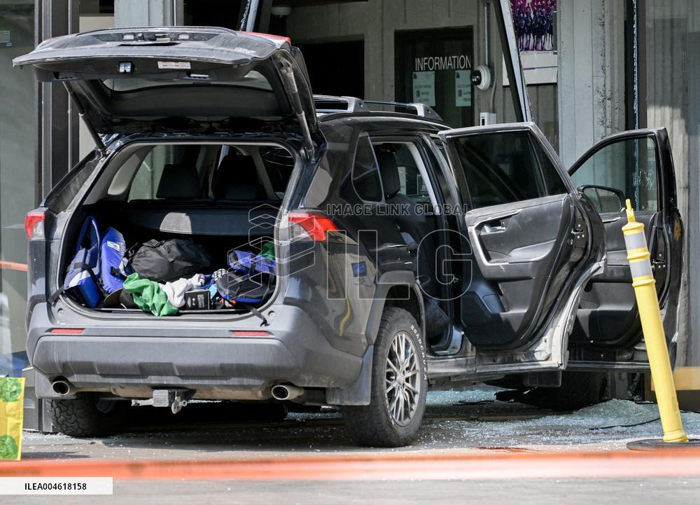 Car Crashes Onto RCMP Headquarters Entrance - Montreal