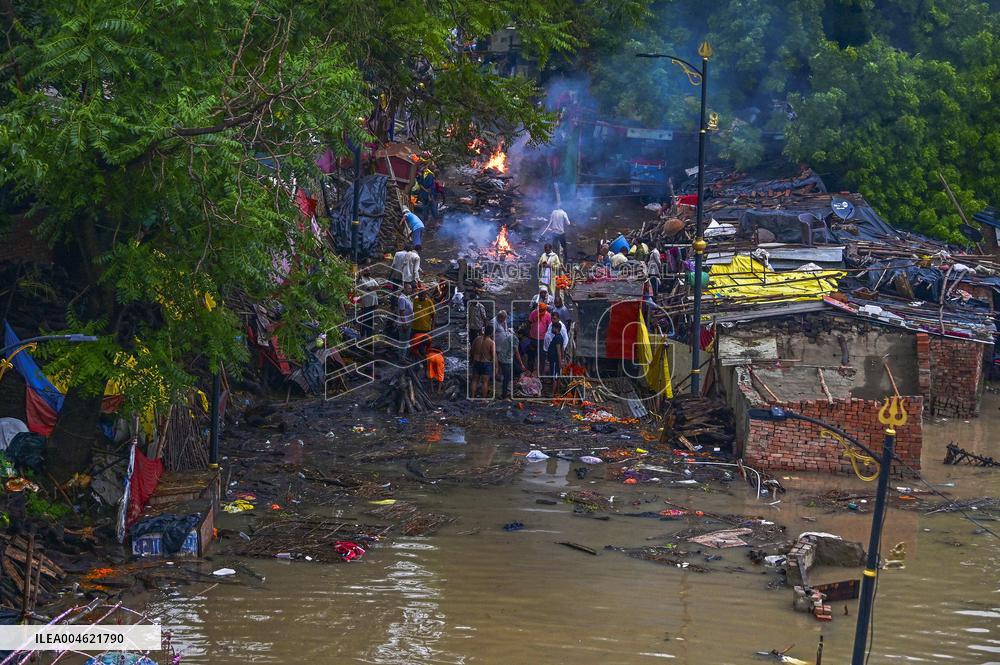 Flood Forces Cremations to Higher Ground