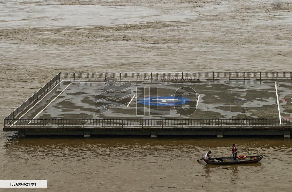 Boatmen Navigate Flooded Yamuna Riverbank