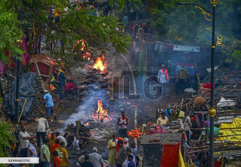 Flood Forces Cremations to Higher Ground