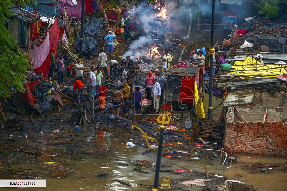 Flood Forces Cremations to Higher Ground
