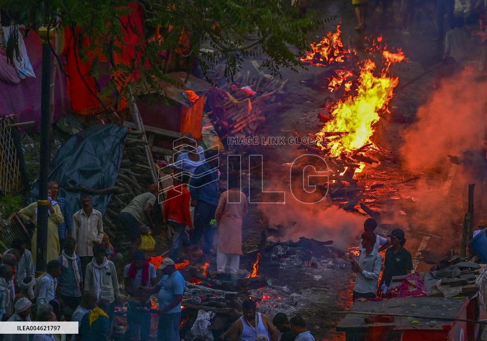 Flood Forces Cremations to Higher Ground