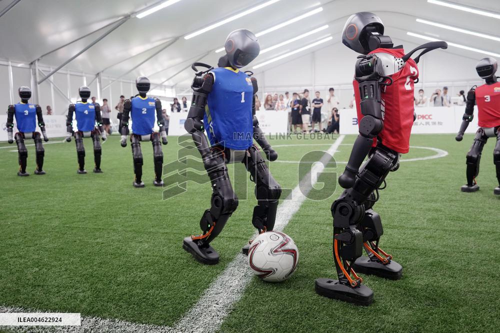 Humanoid robots play football
