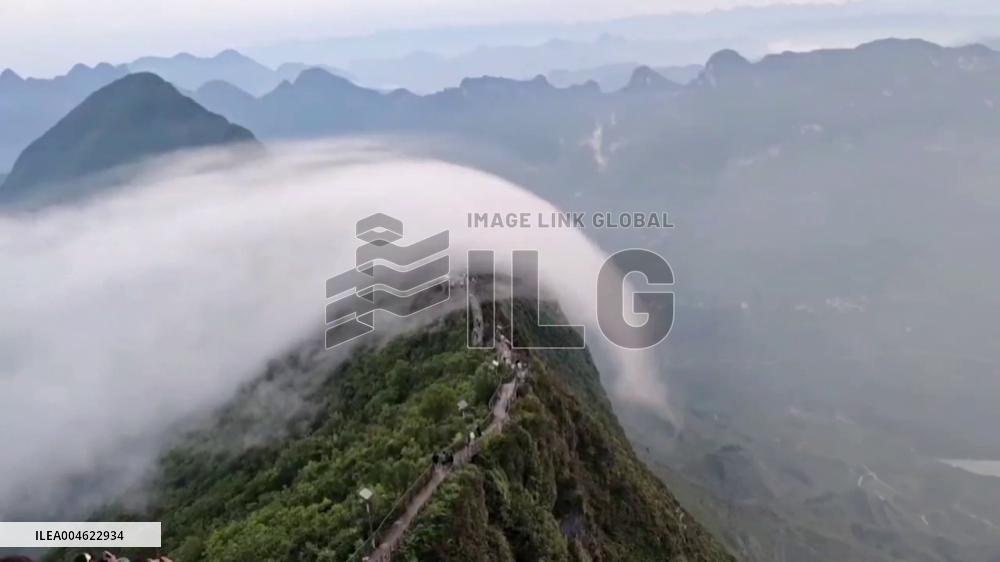 China: Rare ‘Cloud Waterfall’ Stuns Tourists on Laowang Mountain