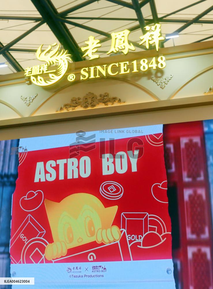 LaoFengXiang Gold Figurine Model at 2025 ChinaJoy