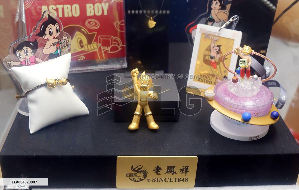 LaoFengXiang Gold Figurine Model at 2025 ChinaJoy