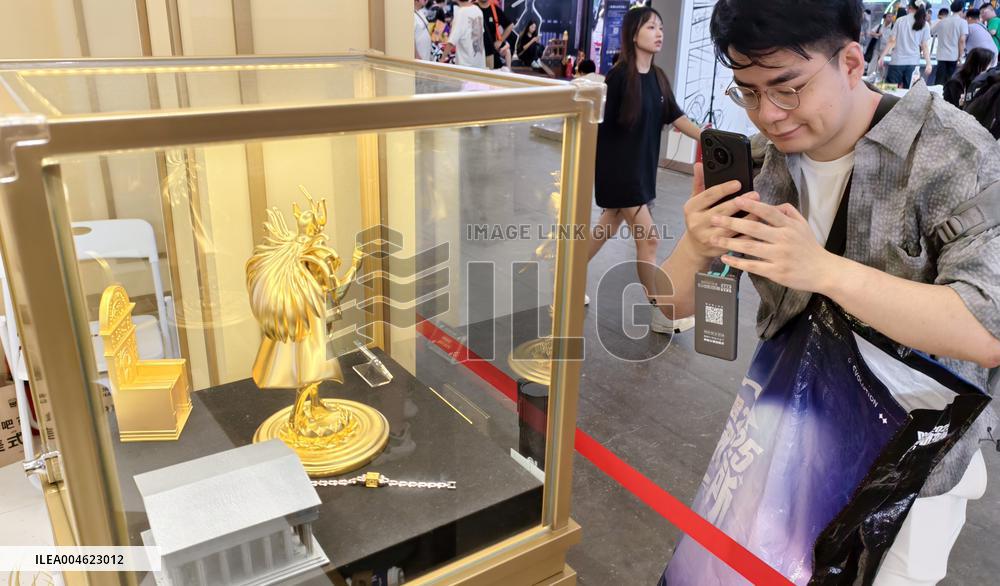 LaoFengXiang Gold Figurine Model at 2025 ChinaJoy