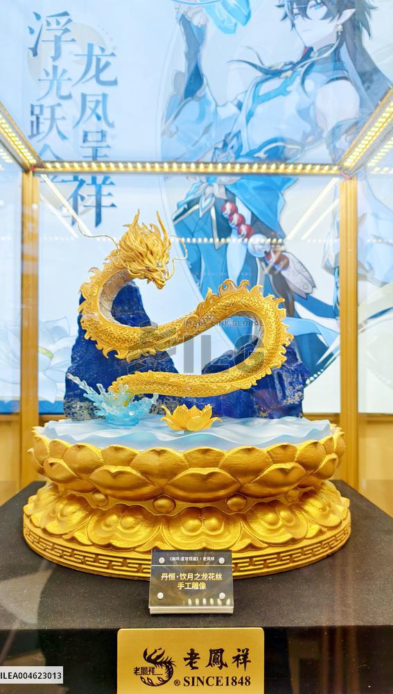 LaoFengXiang Gold Figurine Model at 2025 ChinaJoy