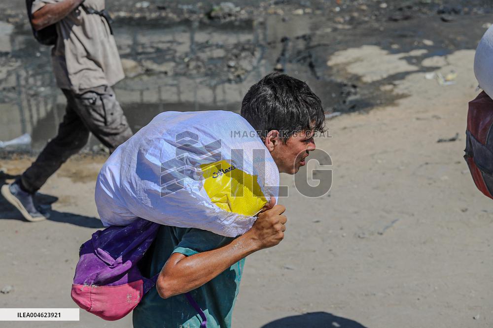 Gazans Flock to Aid Distribution Point - Gaza