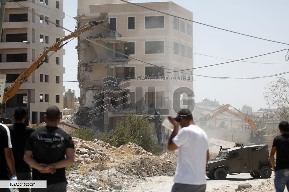 Israeli Excavators Demolish a Building - West Bank