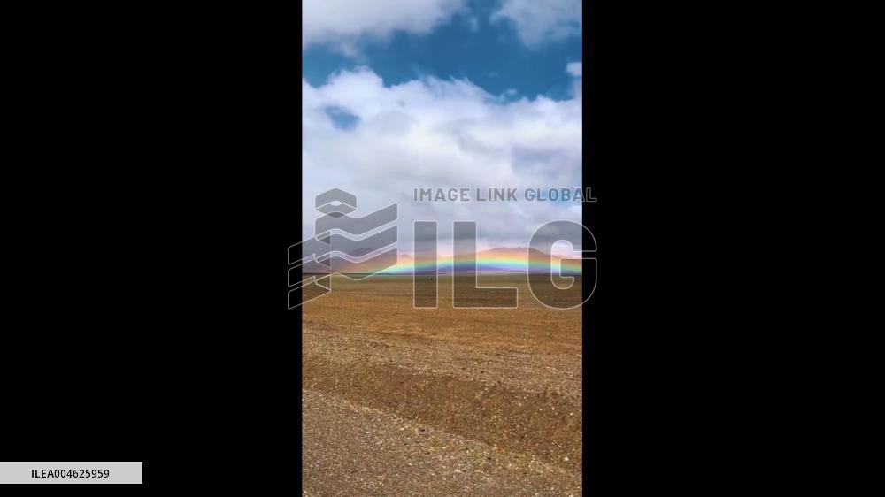 China: Surreal Glow of Rainbow Mountains Captured in Tibet