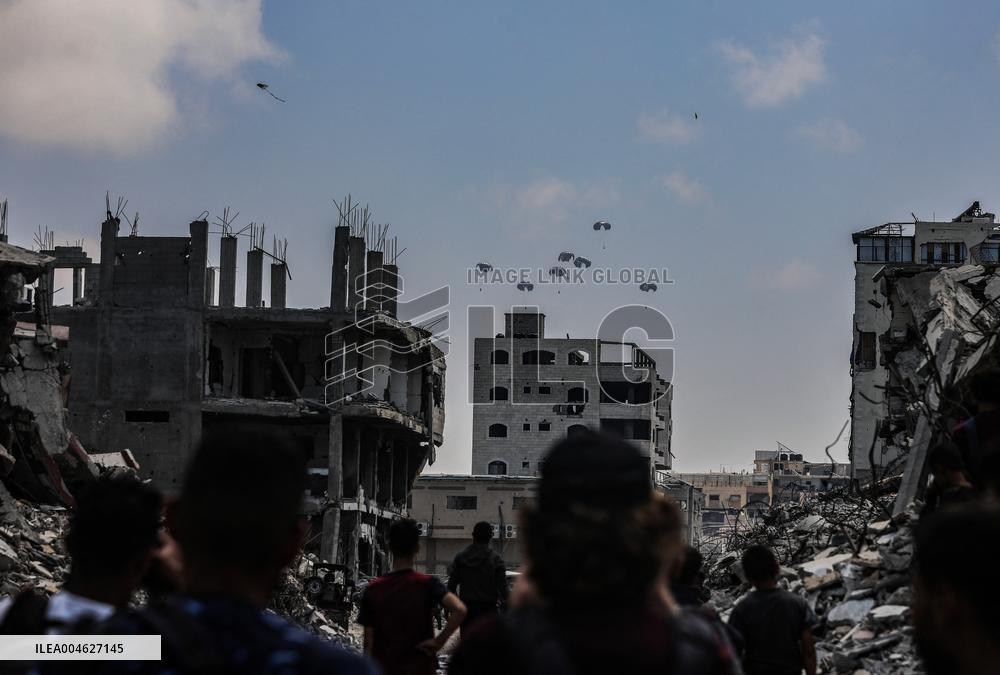 Humanitarian Aid is Airdropped over the Gaza City - Palestine