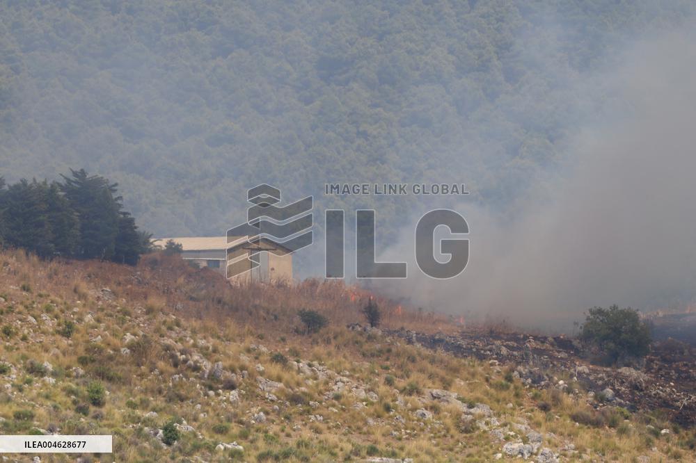 Fire Response in Santa Cristina Gela Helicopters Deployed - Italy