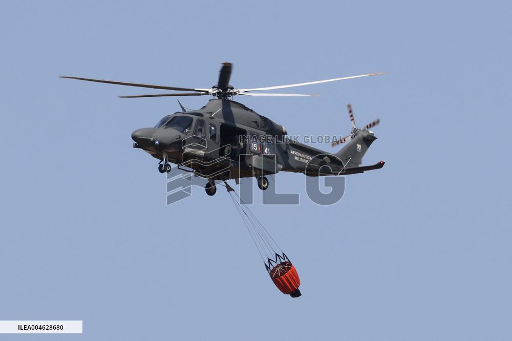 Fire Response in Santa Cristina Gela Helicopters Deployed - Italy