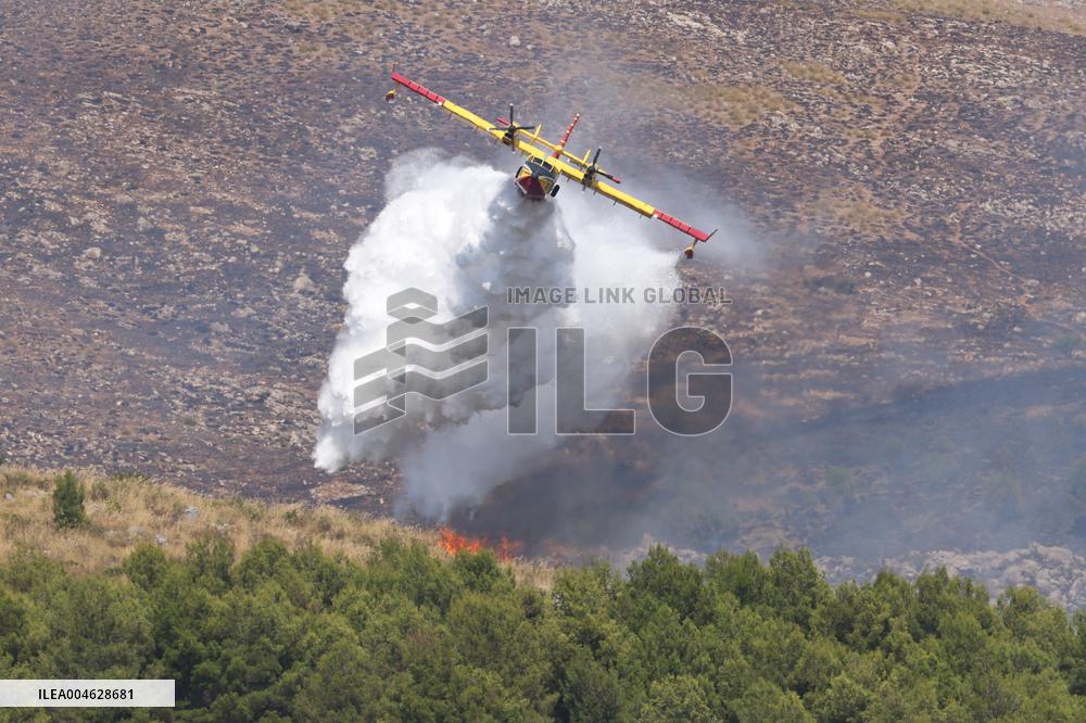 Fire Response in Santa Cristina Gela Helicopters Deployed - Italy