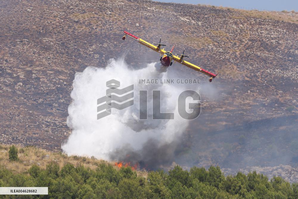 Fire Response in Santa Cristina Gela Helicopters Deployed - Italy