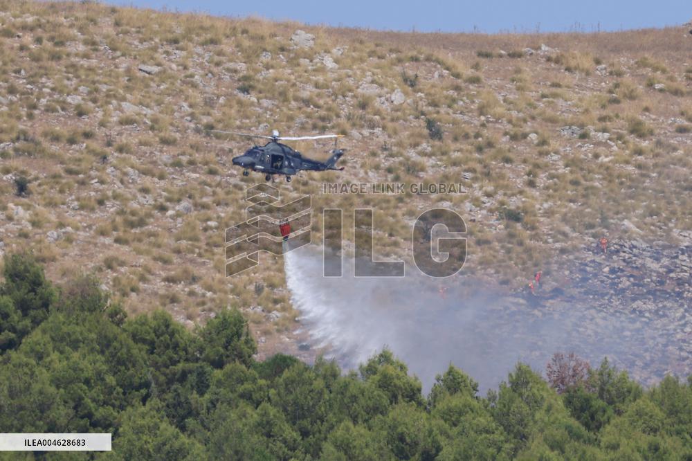 Fire Response in Santa Cristina Gela Helicopters Deployed - Italy