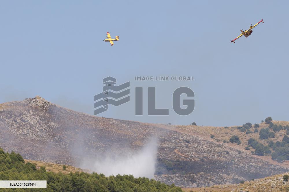Fire Response in Santa Cristina Gela Helicopters Deployed - Italy