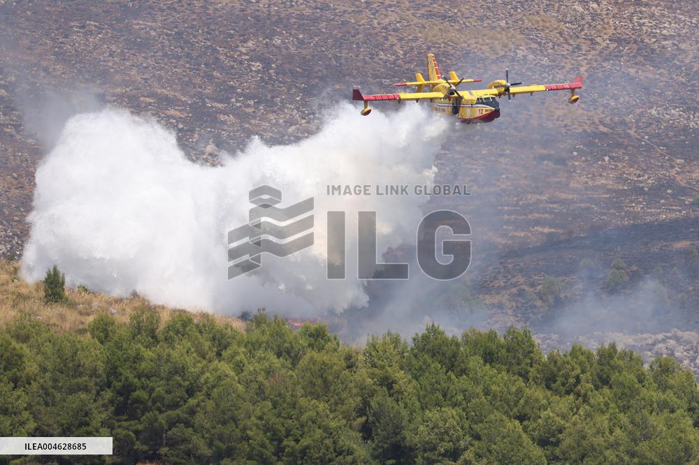 Fire Response in Santa Cristina Gela Helicopters Deployed - Italy