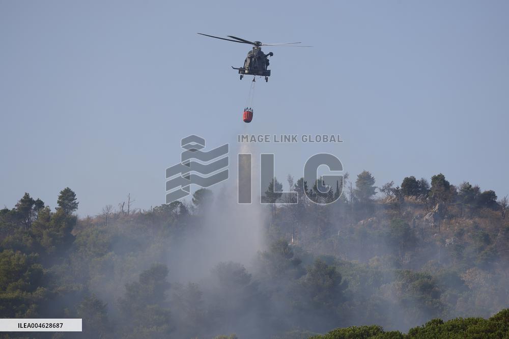 Fire Response in Santa Cristina Gela Helicopters Deployed - Italy