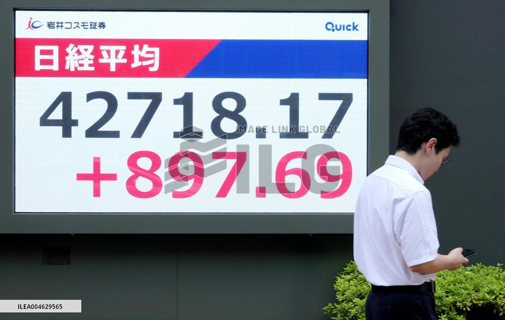 Nikkei stock index ends at record high