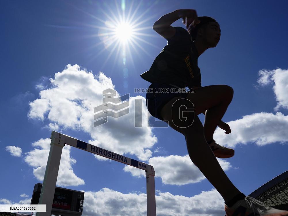 High school athletics race amid summer heat