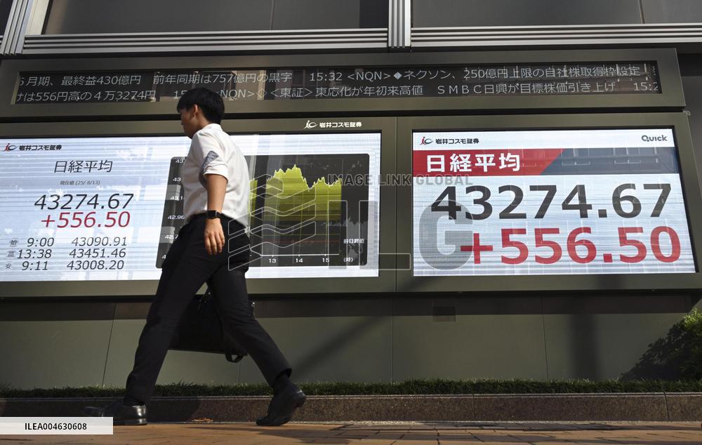 Nikkei index hits record closing high
