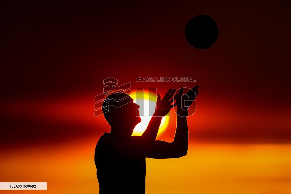 Illustration - Silhouetted at Sunset Amidst Vancouver Island Wildfires - Canada