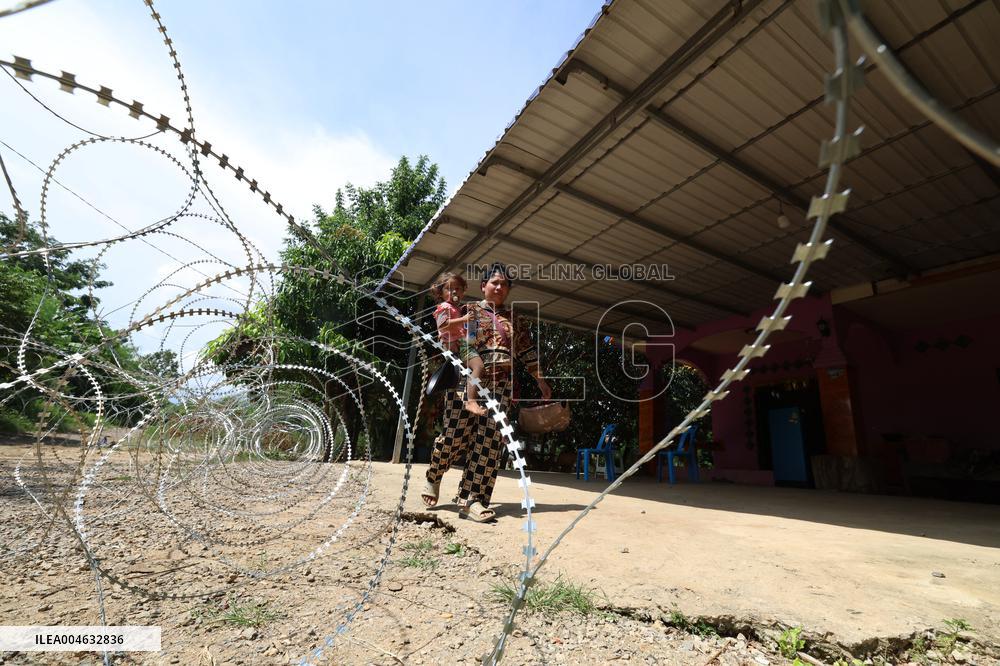CAMBODIA-BANTEAY MEANCHEY-THAILAND-BORDER-BARBED WIRE & TYRES