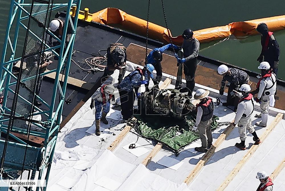 Part of crashed Japan defense force jet recovered