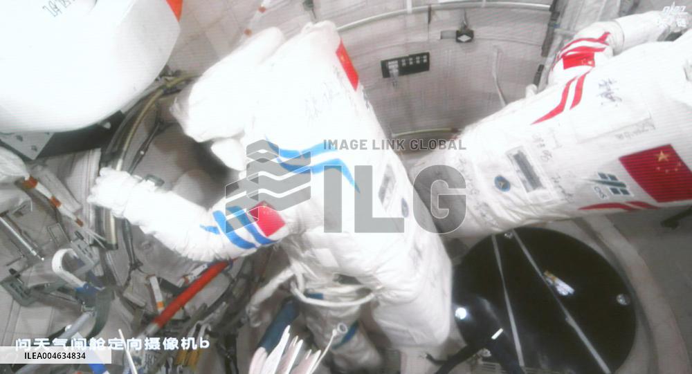 Astronaut Chen Dong Performing Extravehicular Activities