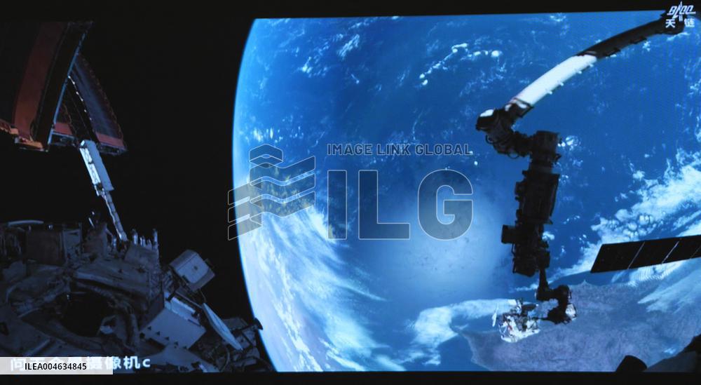 Astronaut Chen Dong Performing Extravehicular Activities