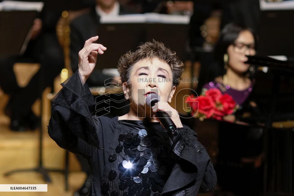 Singer Tokiko Kato sings in China