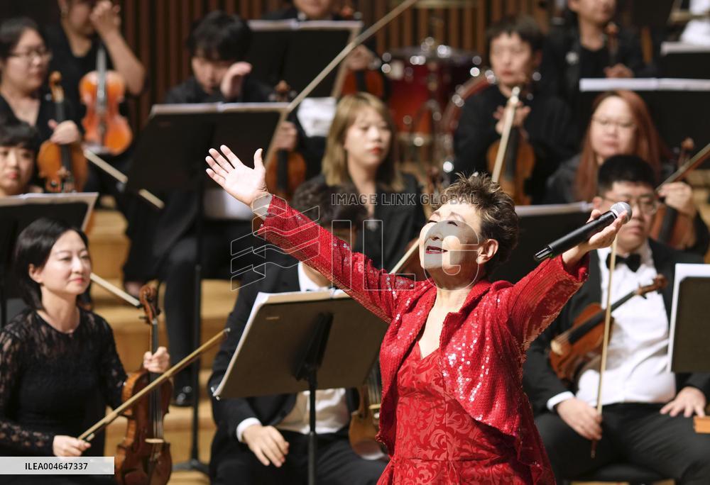 Singer Tokiko Kato sings in China